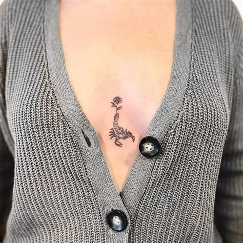 sternum tattoo between breast|The Ultimate Guide to Stunning Sternum Tattoos:。